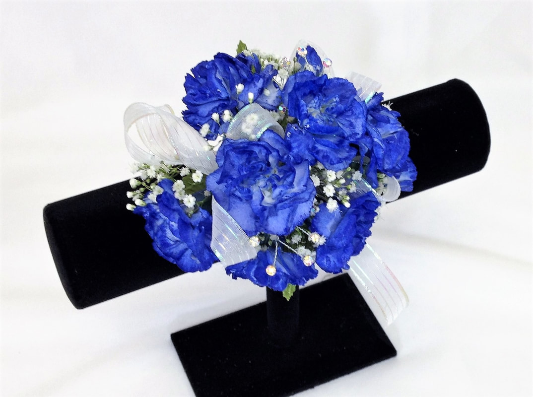 Blue mini carnation corsage