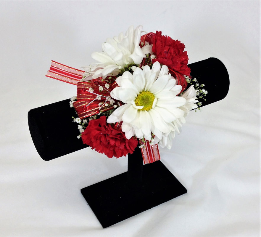 White daisy and Red Mini Carn corsages