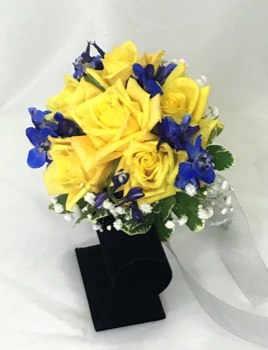 Yellow rose and blue delph hand tied bouquet