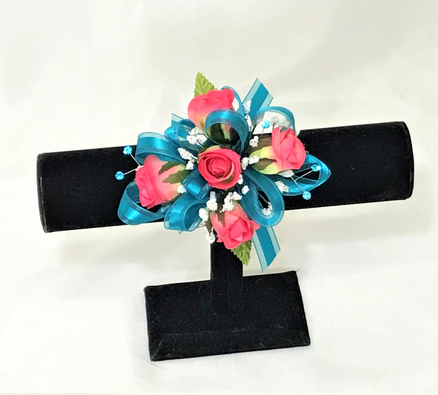 Hot Pink rose corsage with teal ribbon