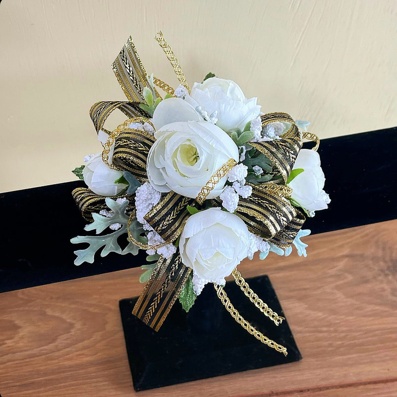 White rose corsage with silver & gold accents