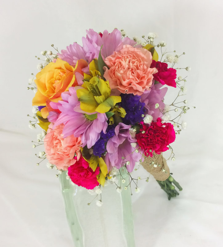 Brightly colored bridesmaids bouquets