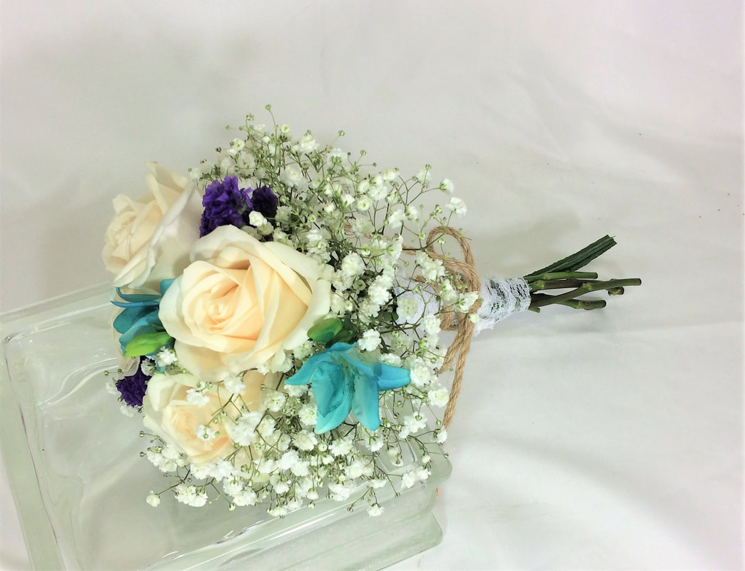 Hand tied rose & freesia bouquet