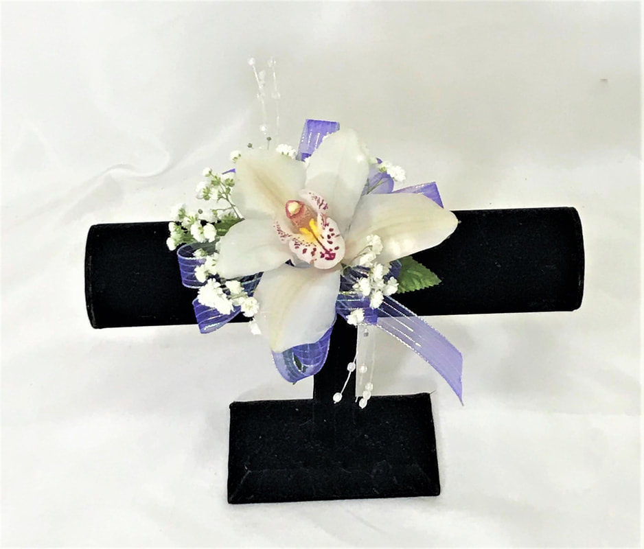 Single white orchid corsage