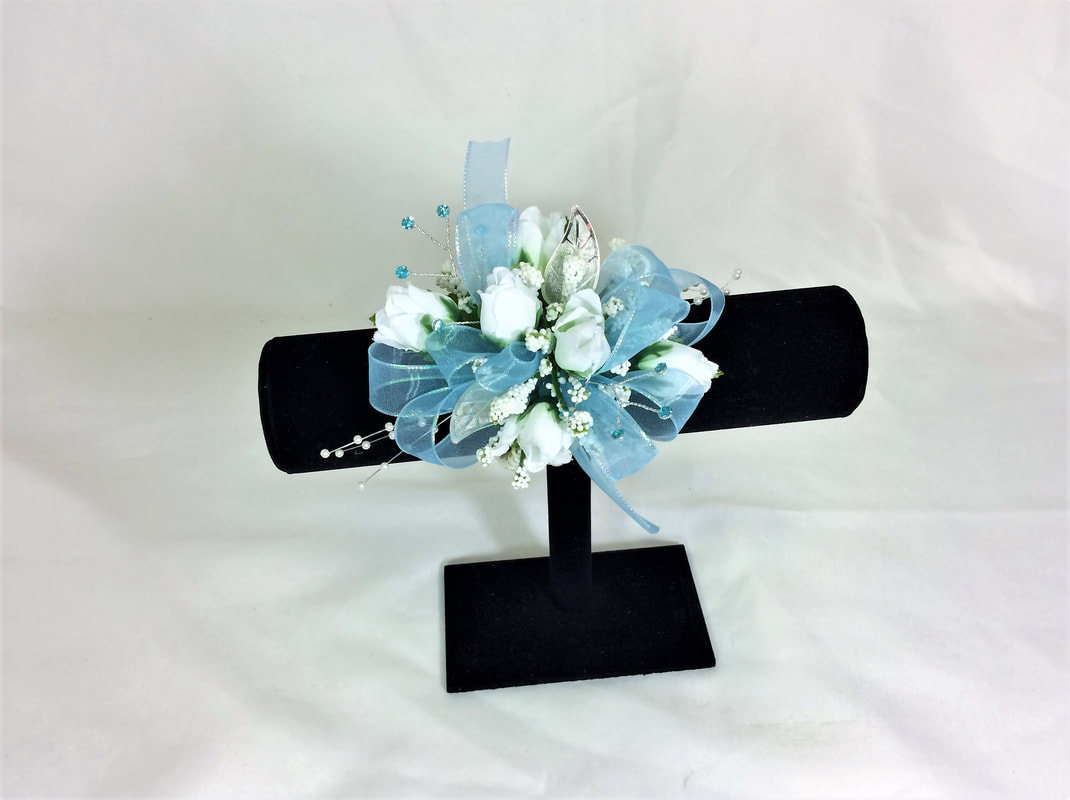 White rose wristlet with aqua ribbon